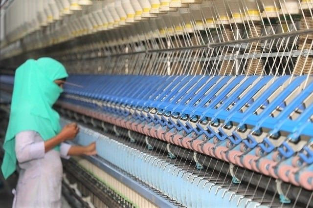 Illegally imported yarn-fabric hits hard domestic textile industry